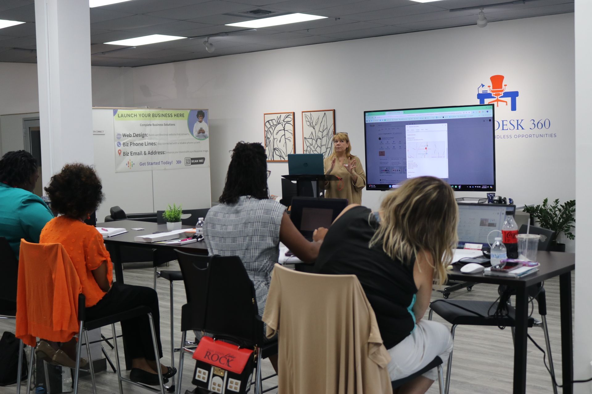 Presenter leading the Google Business Profile Workshop at Flex Desk 360